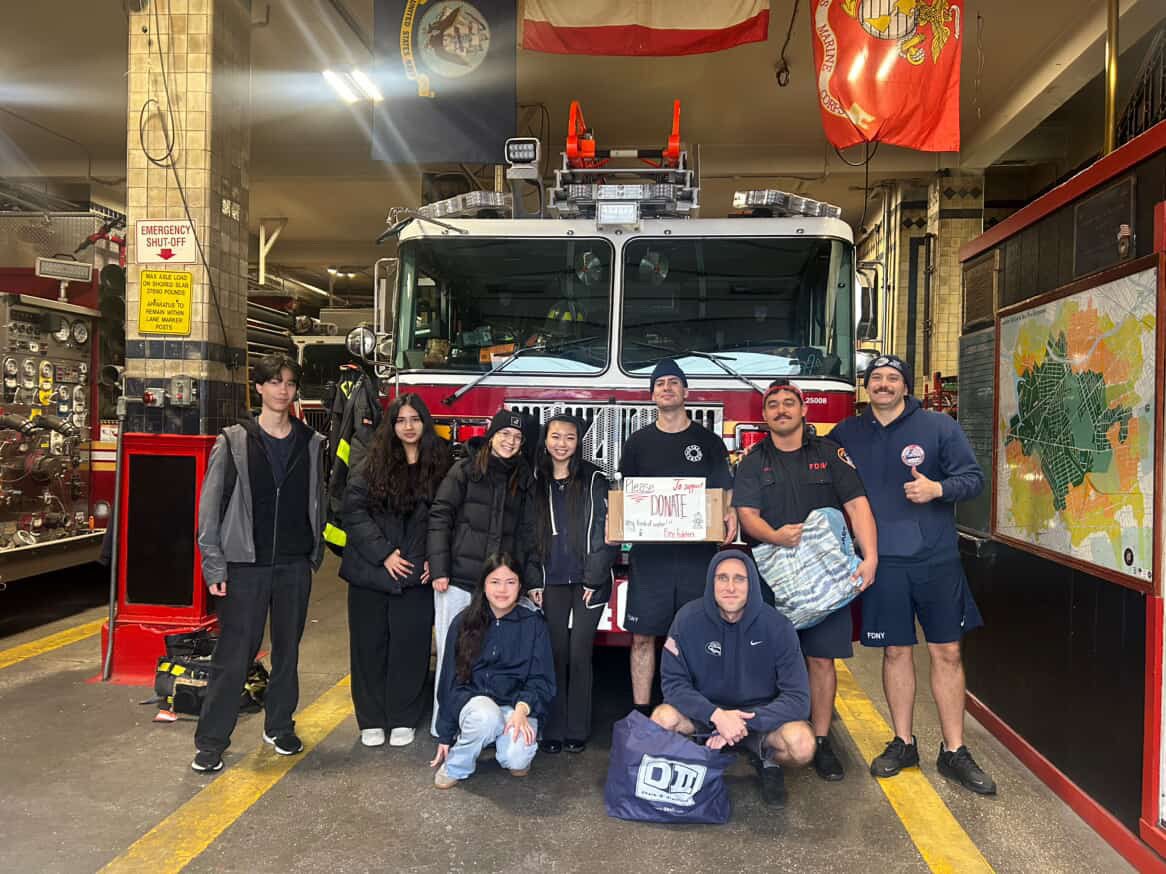 Project Pulmonary students with FDNY firefighters and a donation box