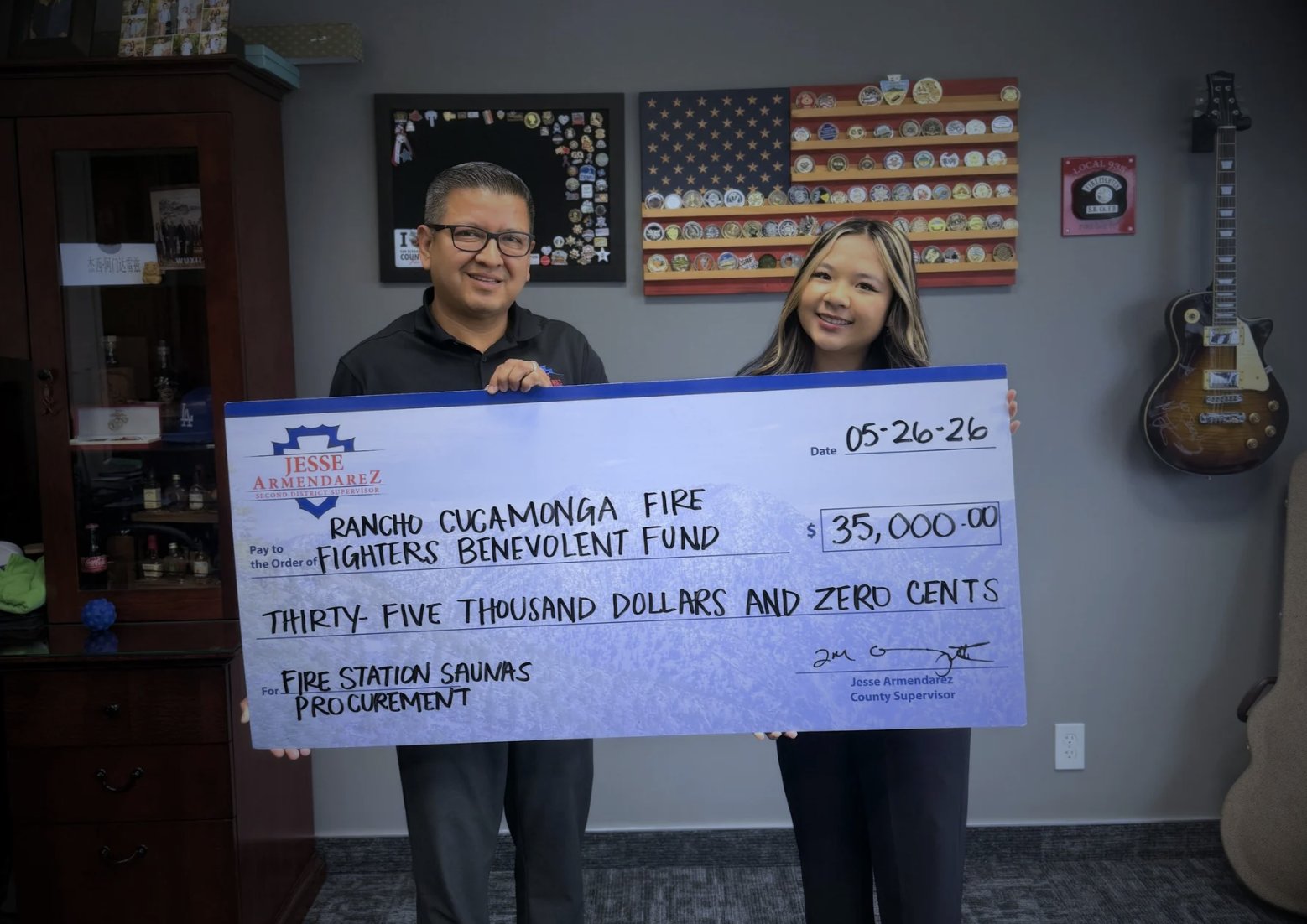 Project Pulmonary receiving a $35,000 check from County Supervisor Jesse Armendarez for fire station detoxification sauna installations
